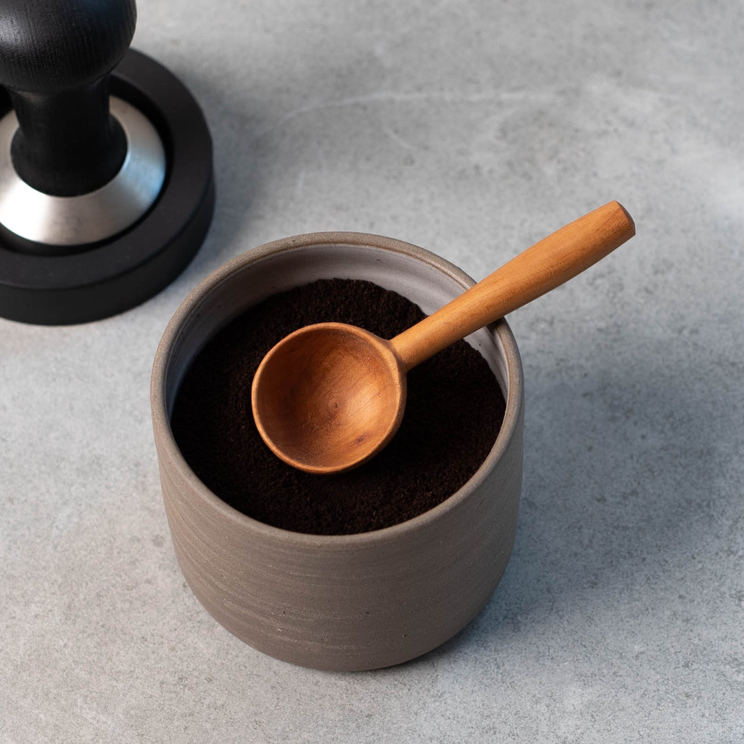 Hergen Böttcher, coffee plumb bob, hand-turned, apple wood, 10cm x 3.5cm